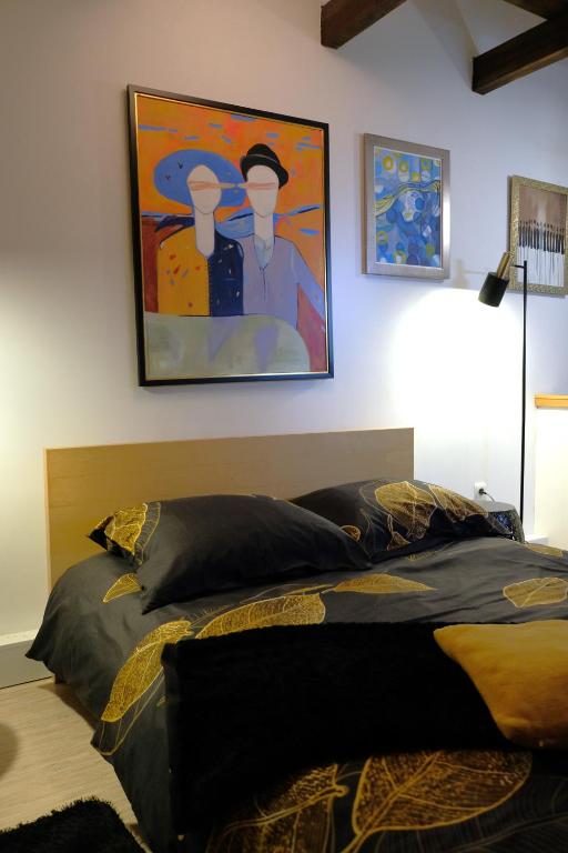 Posteľ alebo postele v izbe v ubytovaní Apartament Poddasze Artysty Mieszkanie Ozonowane