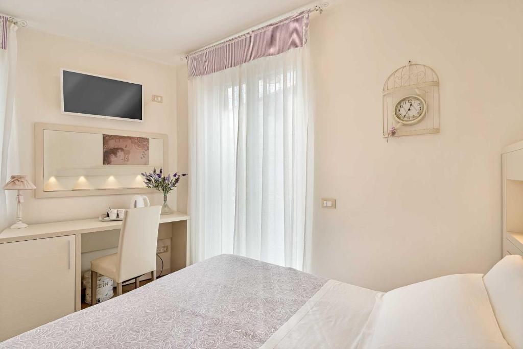 Postel nebo postele na pokoji v ubytování Dreams Guest House
