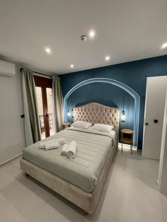Postel nebo postele na pokoji v ubytování Incanto Luxury Suites