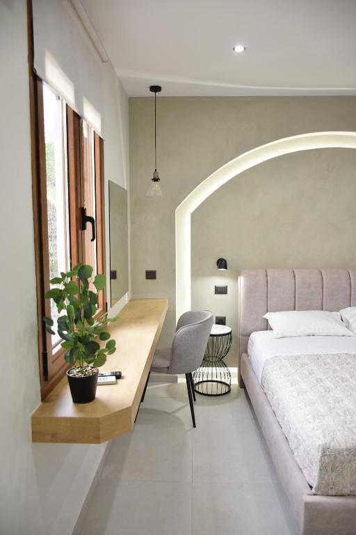 Postel nebo postele na pokoji v ubytování Incanto Luxury Suites