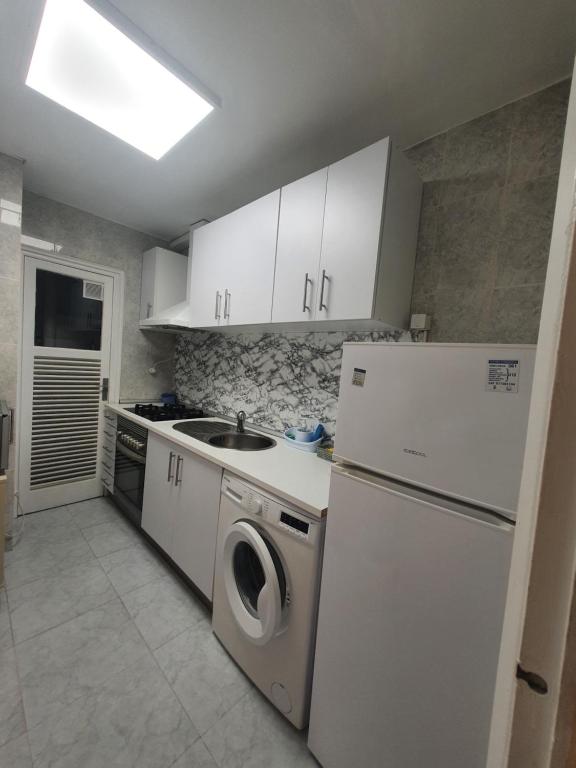 Kuchyňa alebo kuchynka v ubytovaní apartamento Alma