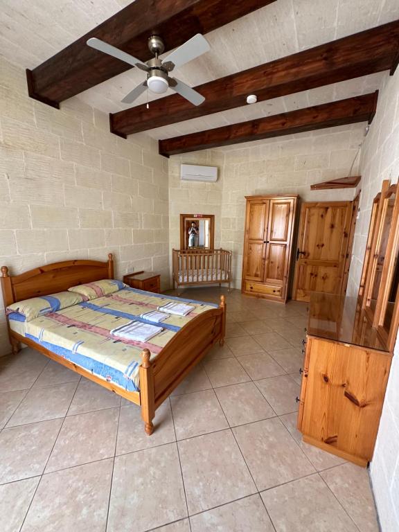 Postel nebo postele na pokoji v ubytování Nawrat Farmhouse