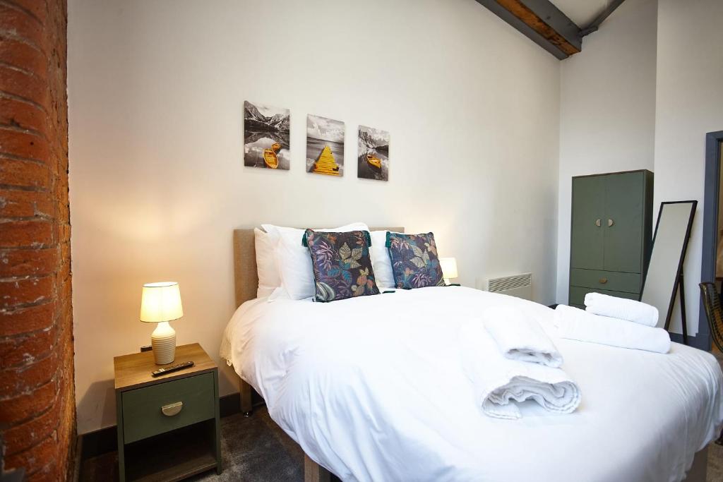 Letto o letti in una camera di The Ruby Suite