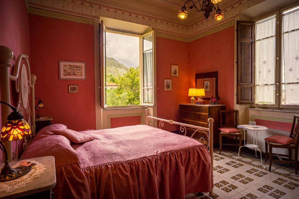Postel nebo postele na pokoji v ubytování Marta Guest House