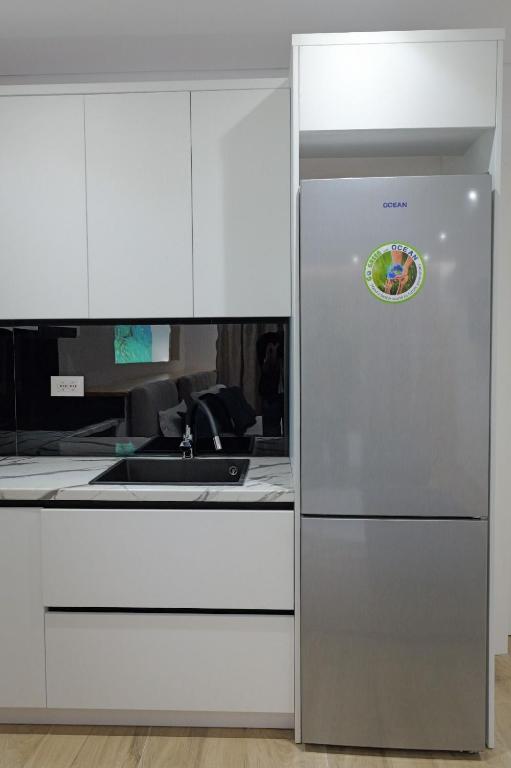 Kuchyň nebo kuchyňský kout v ubytování Cako Rooms Saranda