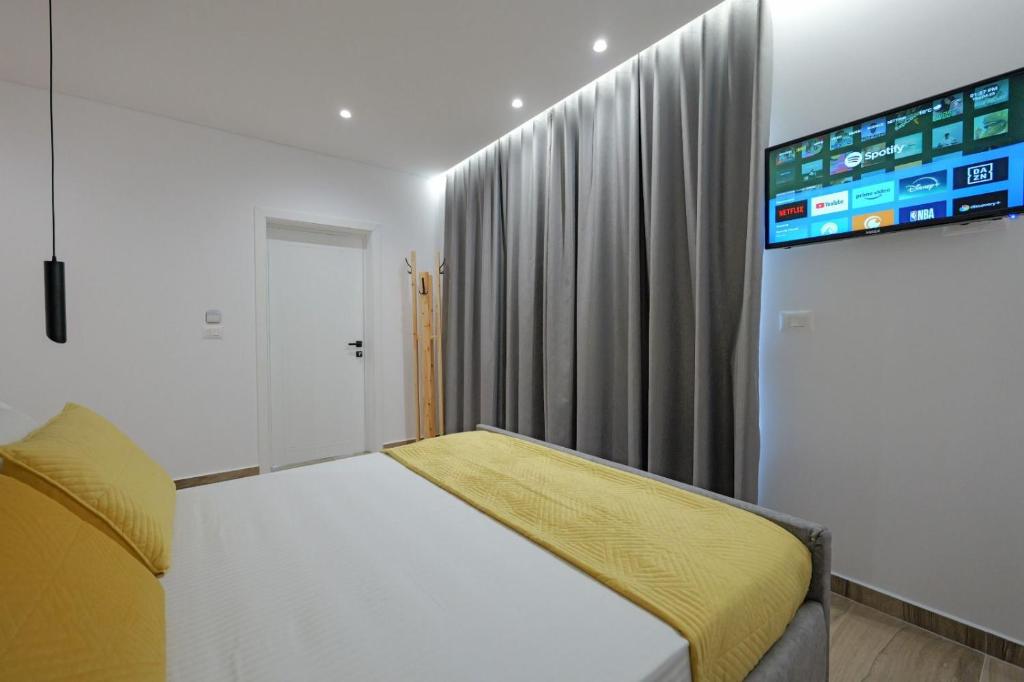TV a/nebo společenská místnost v ubytování Cako Rooms Saranda