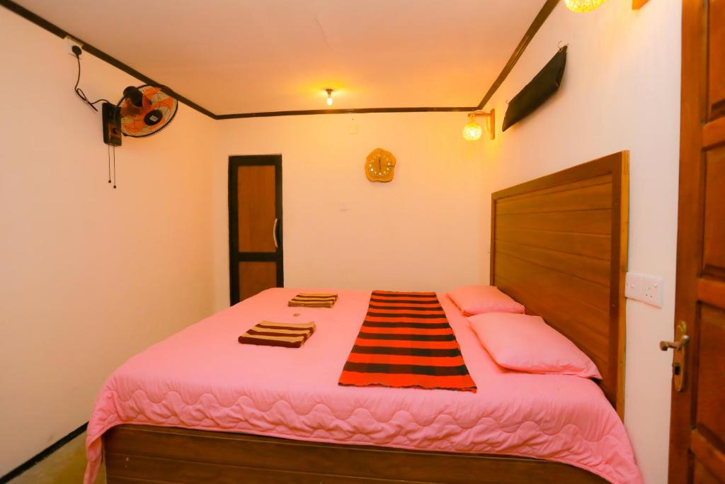 Postel nebo postele na pokoji v ubytování Rosa Shashi Cabanas