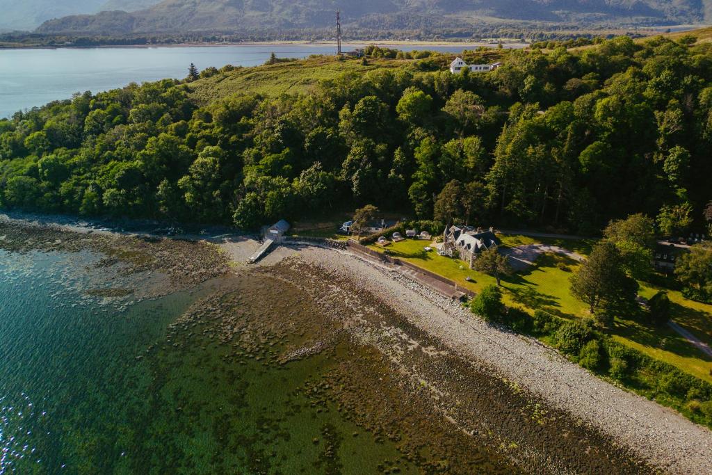 an aerial view of a house on a hill by the water at Ardrhu House Fort William - Superior Room in Fort William