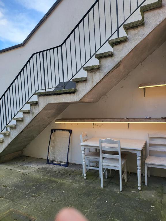 Balkón nebo terasa v ubytování Duinenbank