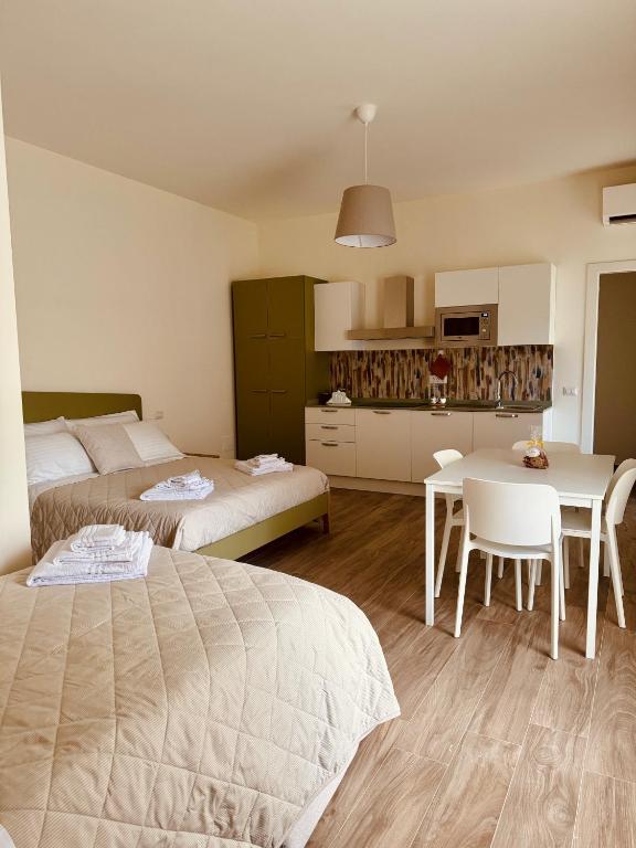 Postel nebo postele na pokoji v ubytování Fresia B&B