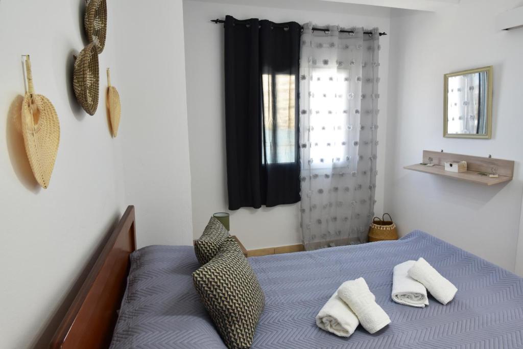 Postel nebo postele na pokoji v ubytování Plazza