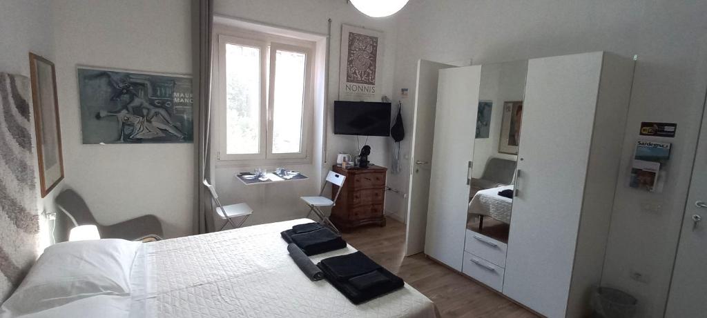 Łóżko lub łóżka w pokoju w obiekcie B&B Leo