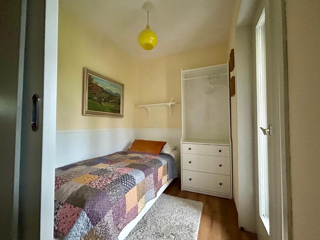 Postel nebo postele na pokoji v ubytování COSY VINTAGE HOUSE