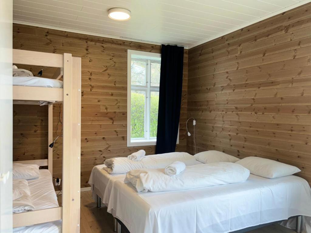 Postel nebo postele na pokoji v ubytování Winjum Hostel Stegastein