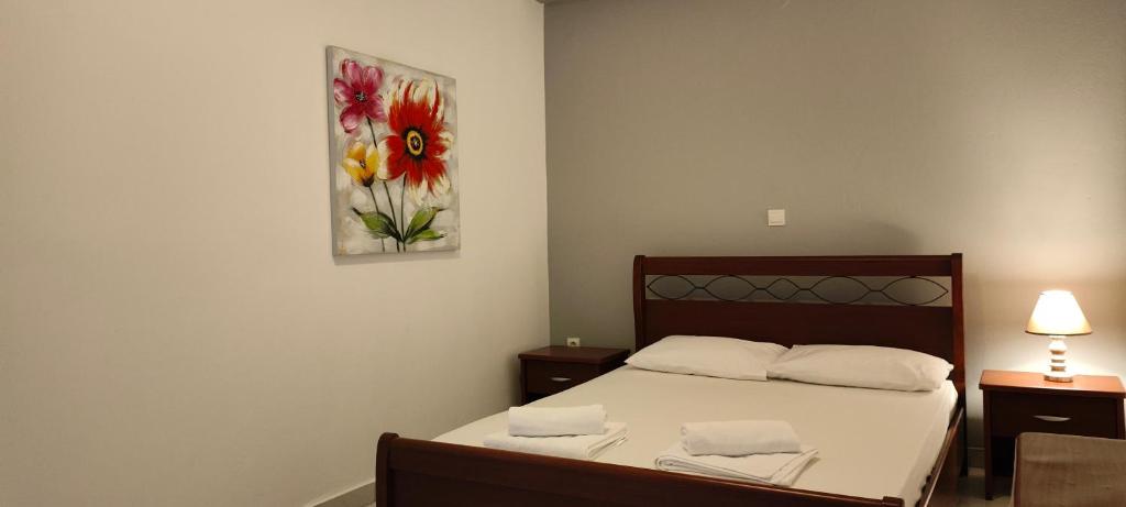 Postel nebo postele na pokoji v ubytování KANALI HOLIDAYS APARTMENT 3