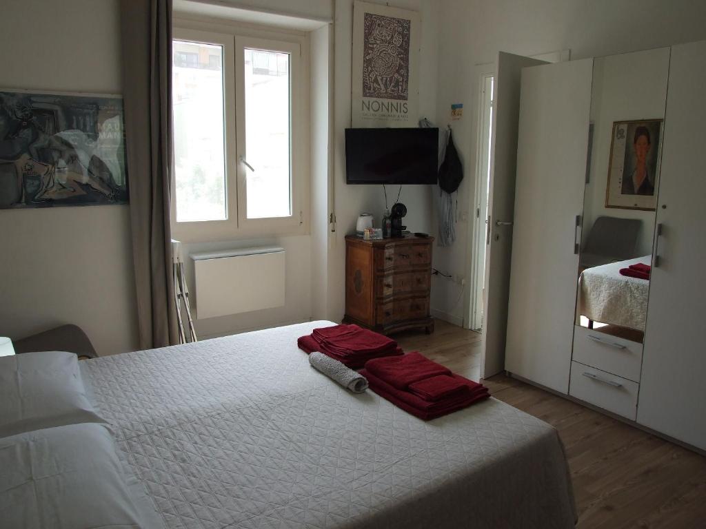 Łóżko lub łóżka w pokoju w obiekcie B&B Leo