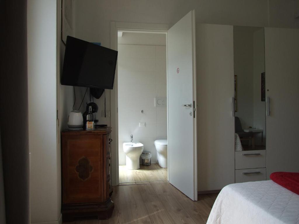 Łóżko lub łóżka w pokoju w obiekcie B&B Leo