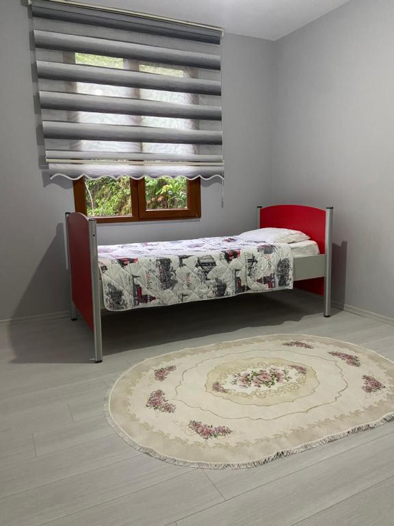 מיטה או מיטות בחדר ב-Fotinos Apart
