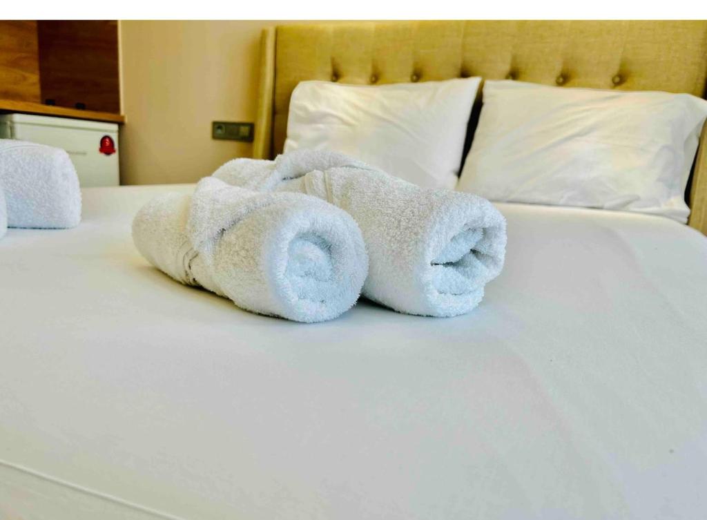 Postel nebo postele na pokoji v ubytování Port Twins Suites No2