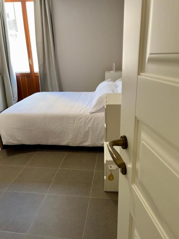 Postel nebo postele na pokoji v ubytování Camere di Bianca