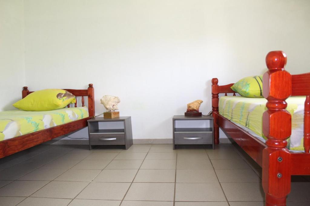 Postel nebo postele na pokoji v ubytování Villa Le Gommier, Meublé de tourisme 3 étoiles