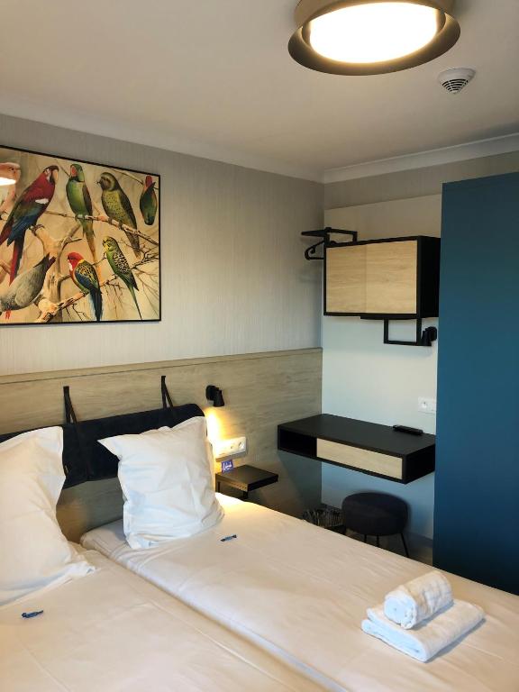 Postel nebo postele na pokoji v ubytování HOTEL LEHOUCK