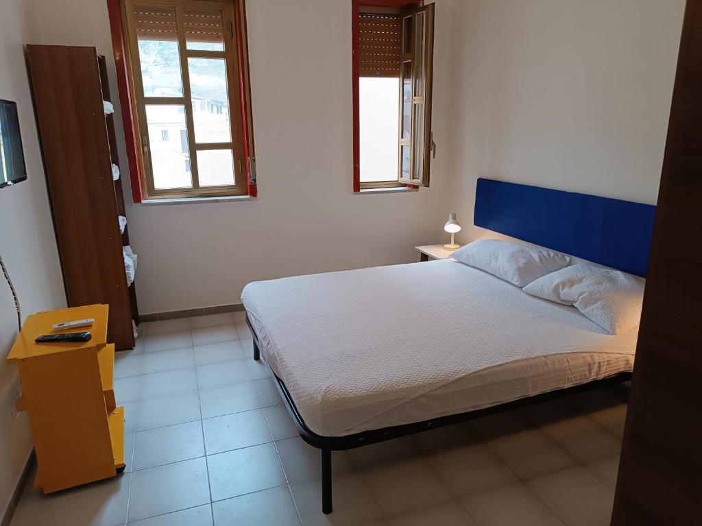 A bed or beds in a room at Casa Vacanze Sferracavallo First