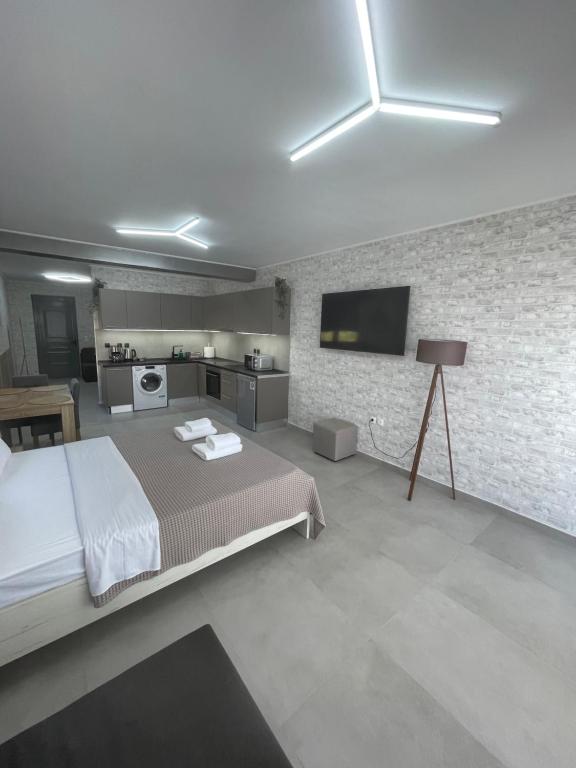 Posteľ alebo postele v izbe v ubytovaní AVR Airport Deluxe Suites 6 AIRPORT FREE SHUTLE