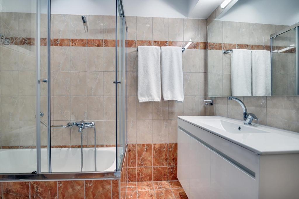 Koupelna v ubytování Palladion Hotel