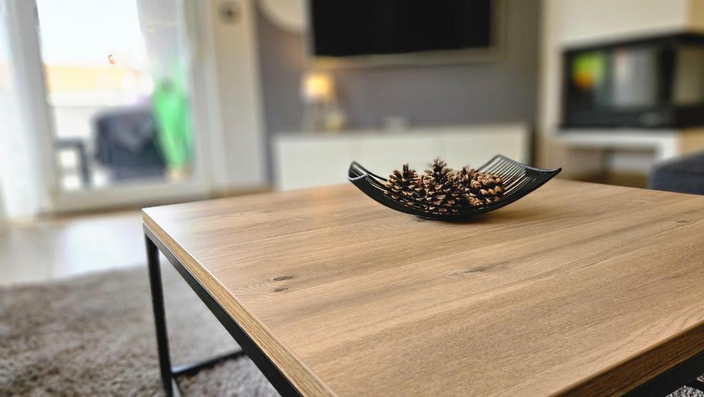 Televízia a/alebo spoločenská miestnosť v ubytovaní Eximius Apartment