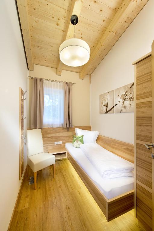 Posteľ alebo postele v izbe v ubytovaní Apartment Dorfjuwel