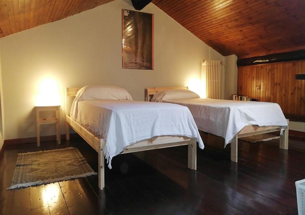Postel nebo postele na pokoji v ubytování Ai Musei Casa Vacanze