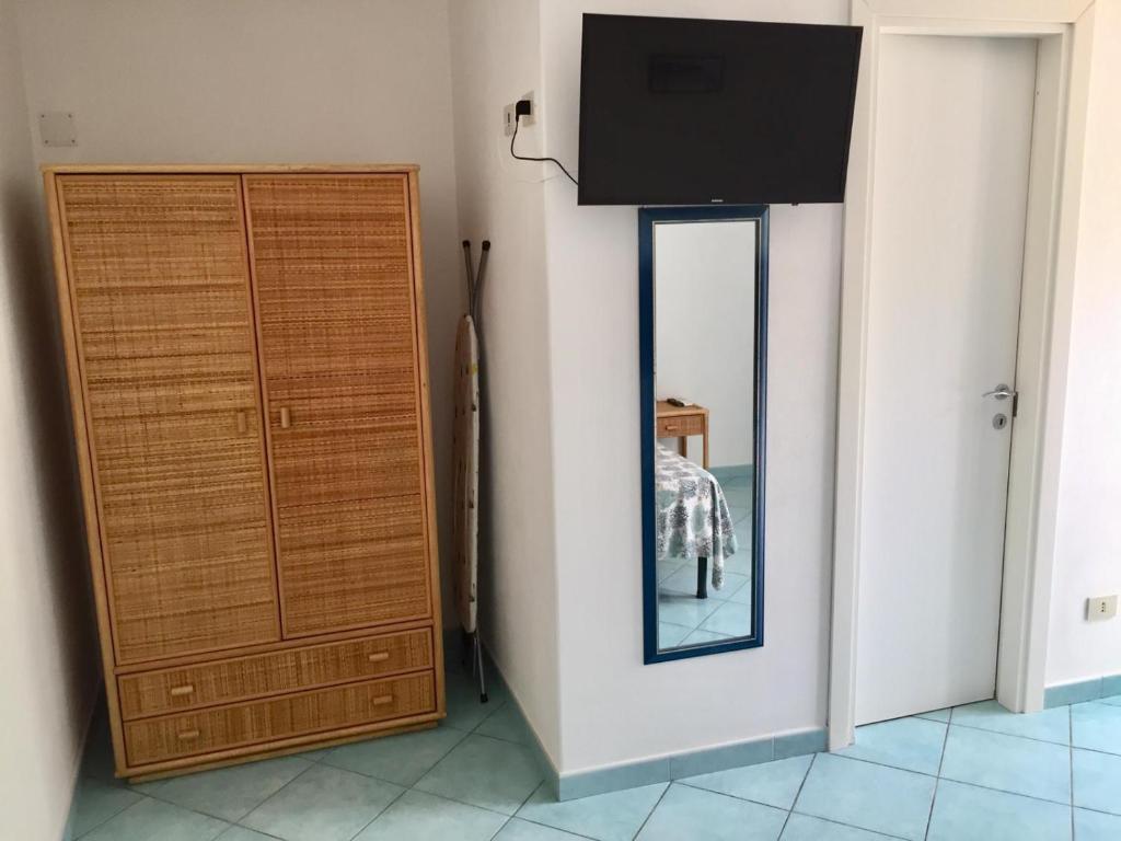 TV a/nebo společenská místnost v ubytování Vento di Terra Ponza