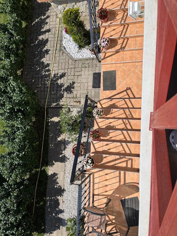 Vonkajšia záhrada v ubytovaní Rege apartman 2