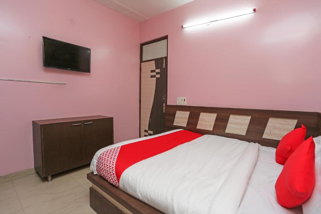 Cama o camas de una habitación en Flagship Hotel Owish
