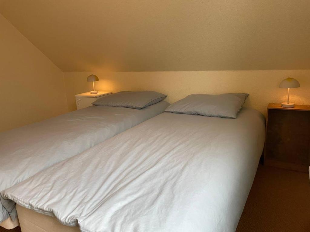 Postel nebo postele na pokoji v ubytování Pension Solvang