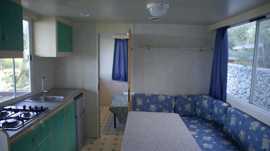Kuchyň nebo kuchyňský kout v ubytování Villaggio La Giara