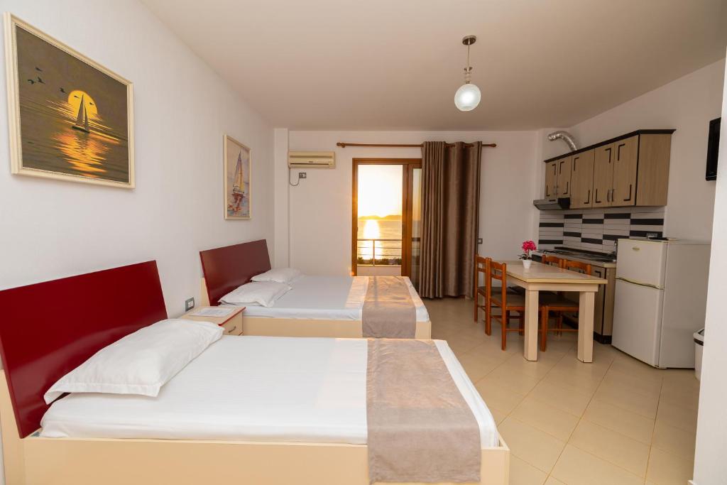 Kuchyň nebo kuchyňský kout v ubytování Hotel Idi