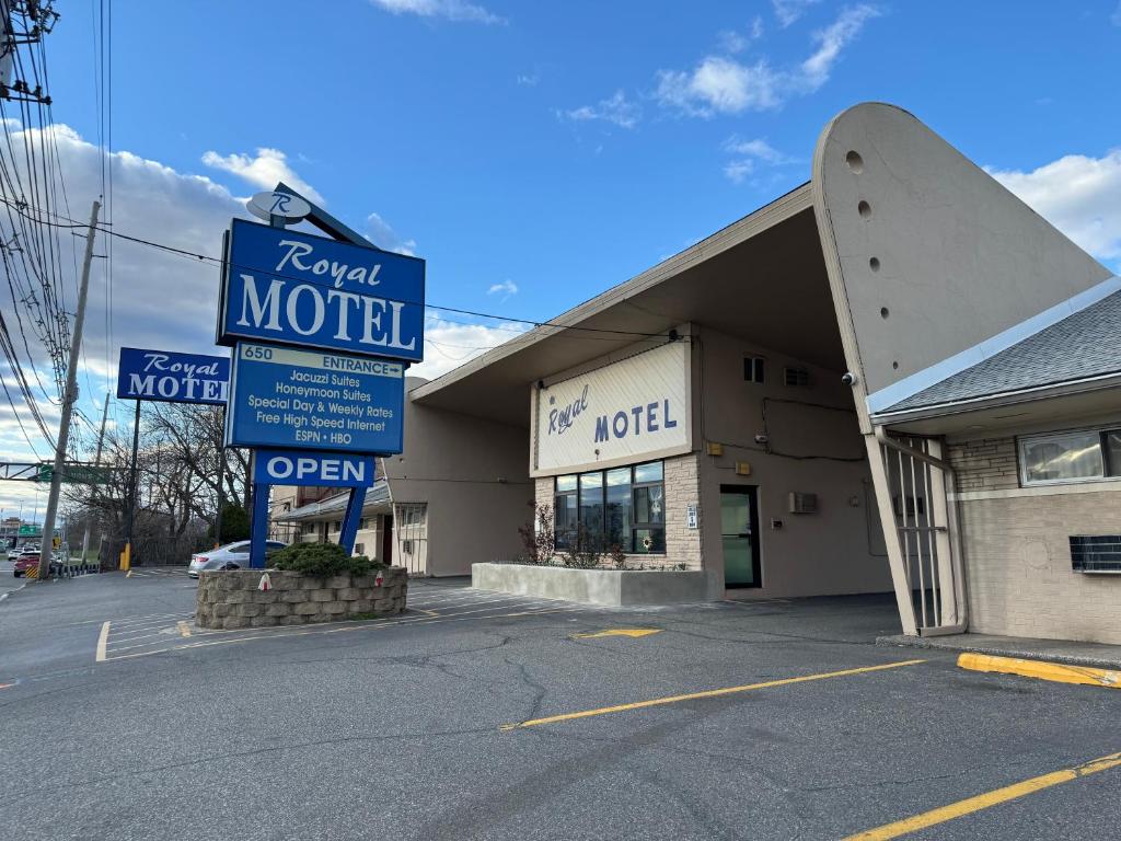 a motel sign in front of a hotel at Royal Motel in Secaucus