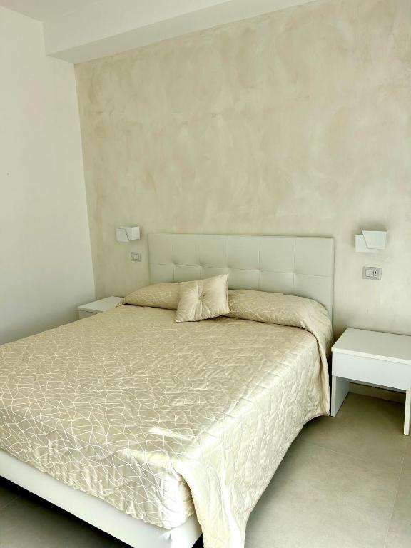 Postel nebo postele na pokoji v ubytování Gemini Luxury Rooms