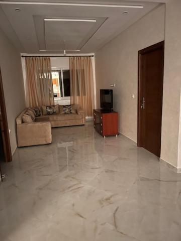 TV a/nebo společenská místnost v ubytování Manami Appartementen AlHoceima
