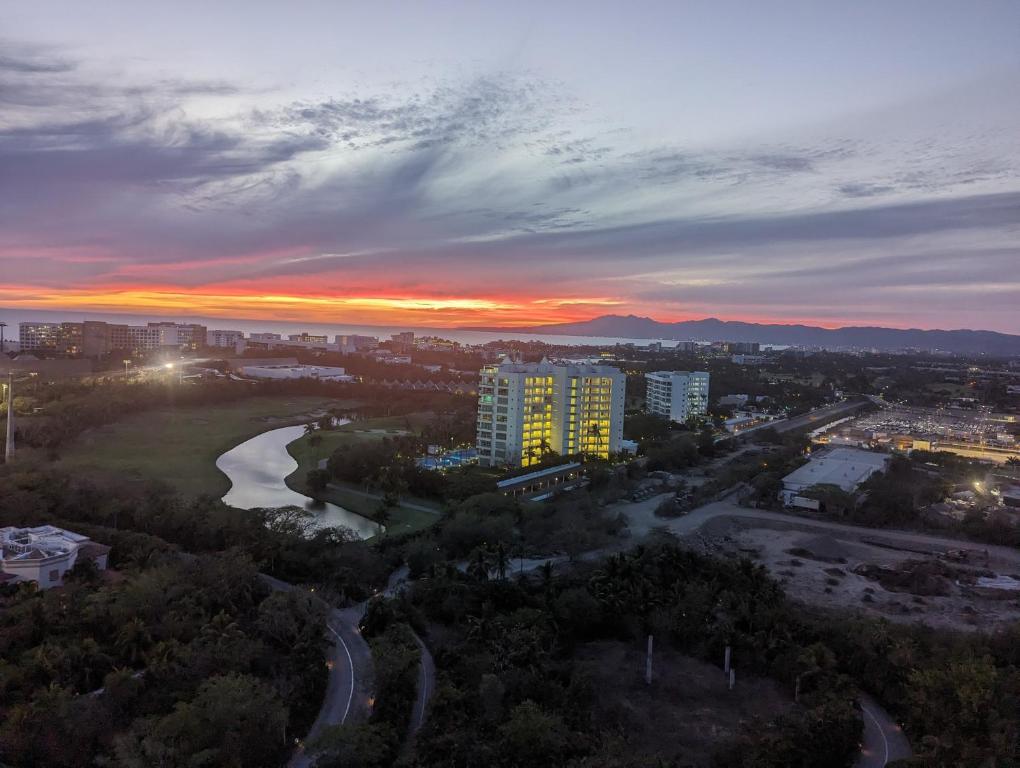an aerial view of a city at sunset at 2bedroom Grand luxxe in Nuevo Vallarta 