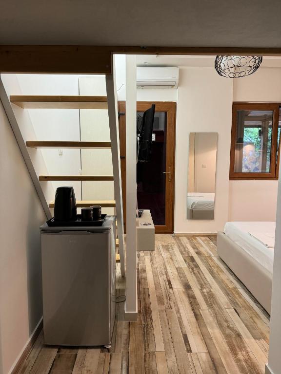 Postel nebo postele na pokoji v ubytování Guest Room Angolo Toscano
