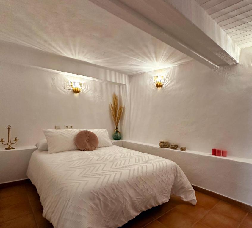 Postel nebo postele na pokoji v ubytování Casita Villares