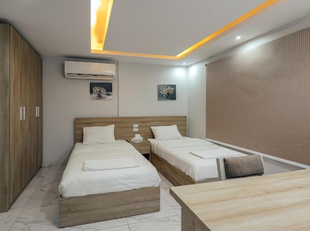 A bed or beds in a room at Hostel 390