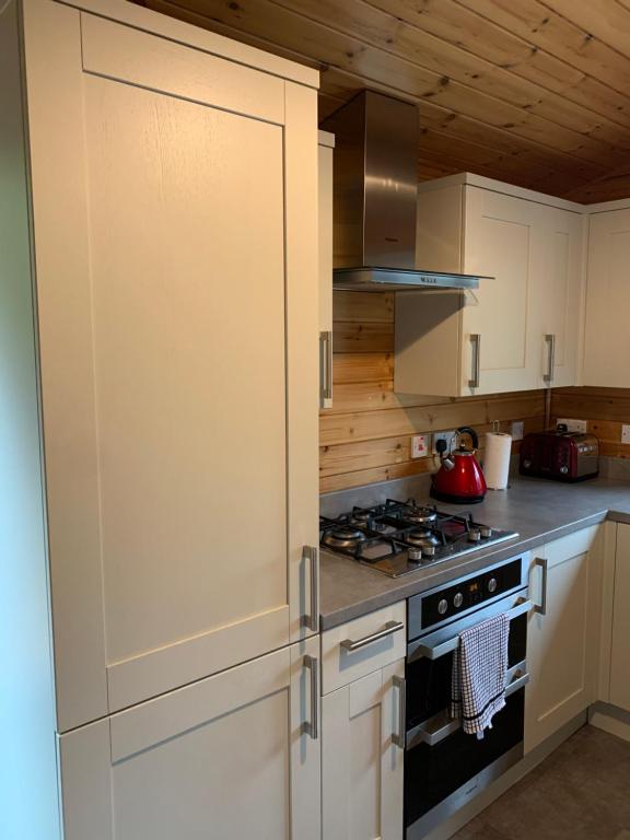 Kuchyň nebo kuchyňský kout v ubytování Corrie Lodge, Glendevon