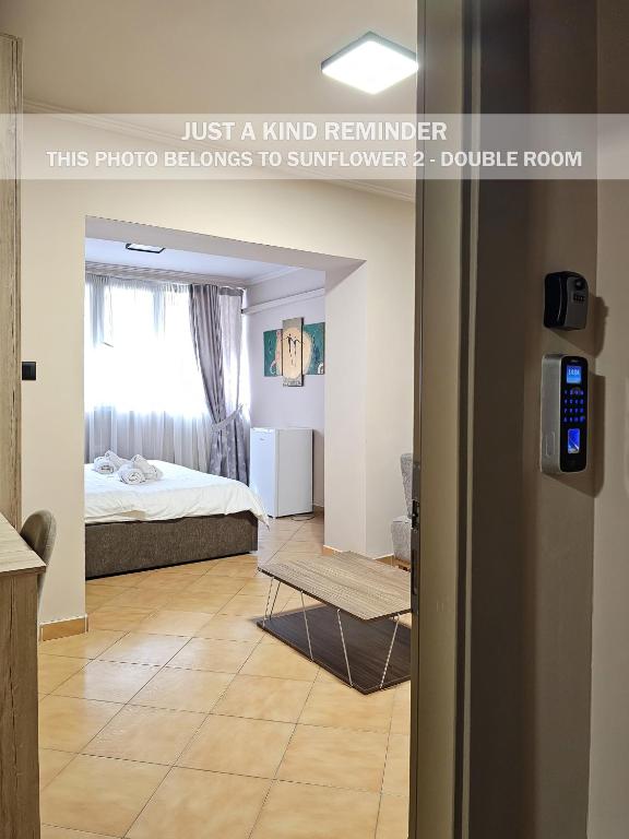 Postel nebo postele na pokoji v ubytování Sunflower Rooms