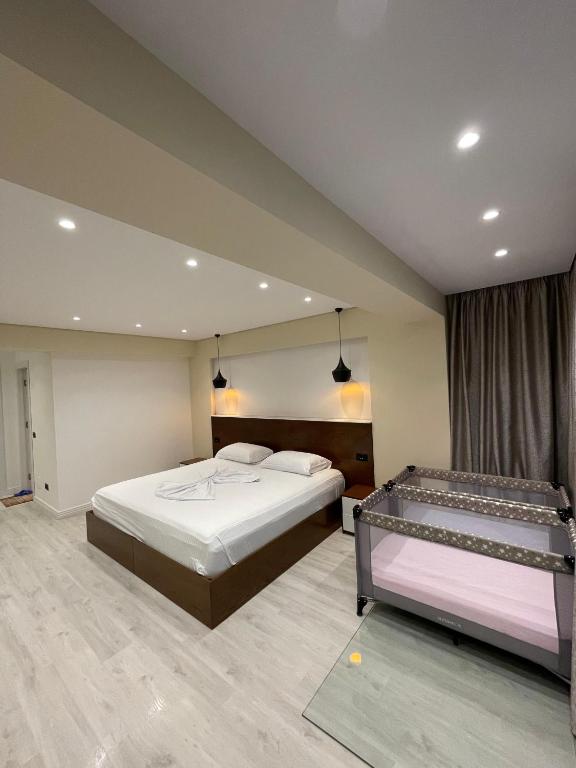 Postel nebo postele na pokoji v ubytování HOME 12
