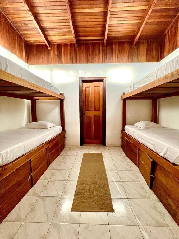 Postel nebo postele na pokoji v ubytování Hotel Exotic Lodge