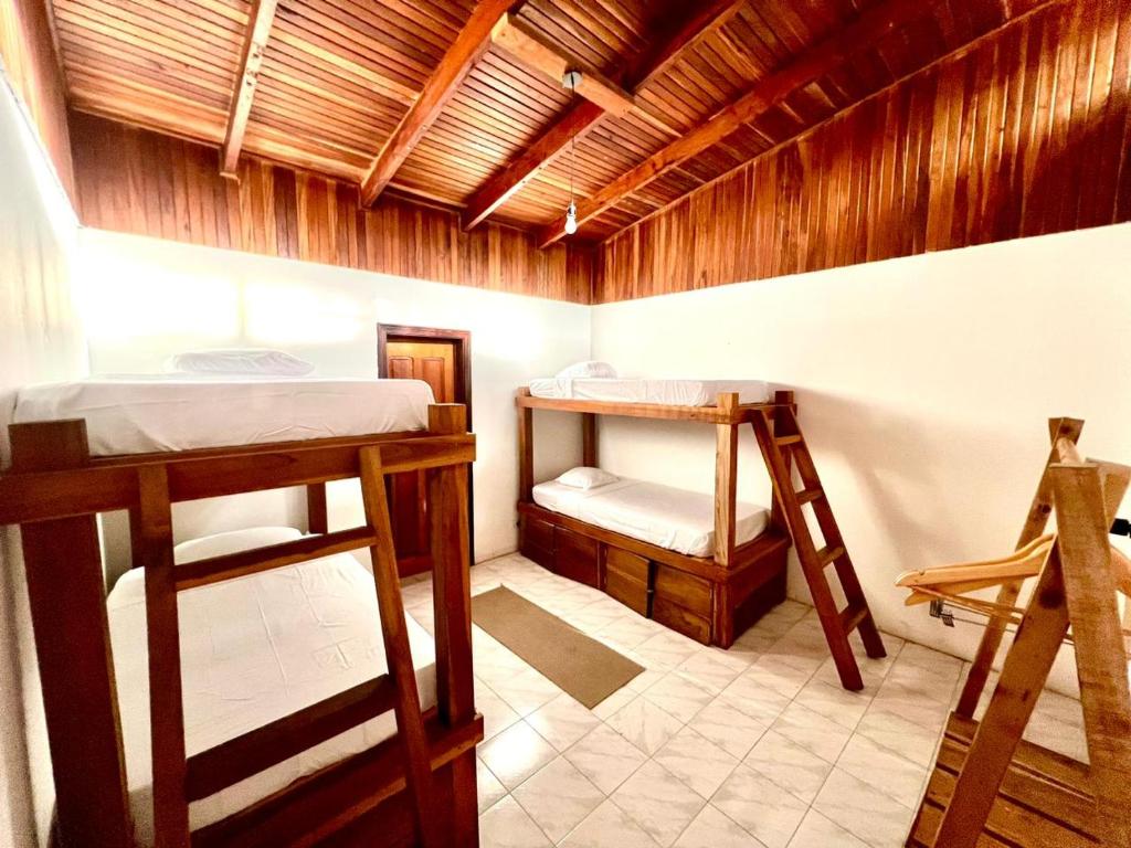 Postel nebo postele na pokoji v ubytování Hotel Exotic Lodge